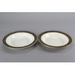 An art deco Soho pottery six place part dinner service, including six soup bowls, six side plates,