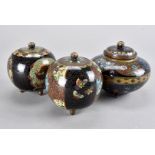 Three late Meiji period cloisonné jars and covers, two spherical and one of squat form, each with