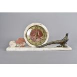 An Art Deco period marble clock, having exotic spelter and gilt pheasant with eight day movement