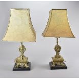 A pair of brass table lamps, the lamps having pierced decoration to the top, on rectangular urn