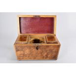 A mid 19th century burr walnut tea caddy, having banded design to sarcophagus box, lacks escutcheon,