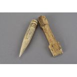 A 19th century carved bone fid tool, for working rope and canvas in marlinspike seamanship 9.5 cm L,