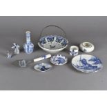 A collection of Delft and other blue and white plates, together with various blue and white and