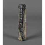 An early Chinese jade Tsung, of rectangular form with archaic carved body in varying tones of