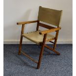 A vintage beech and canvas child's folding chair, 61cm high, c1950s, perfect for the beach or