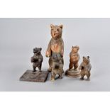 A collection of seven Black Forest bears, all carved standing, tallest 21 cm high (7)