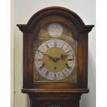A 20th Century oak cased grandmother clock, with brass and steel chapter ring, eight day movement,