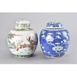 Two late 19th/early 20th Century Oriental ginger jars and covers, one in blue and white, similar