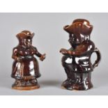 A mid 19th Century treacle glazed Staffordshire toby jug and cover, modelled as the Snuff Taker,
