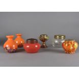 A collection of coloured and plain glass, vases, posy holders etc