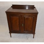 A 19th Century mahogany wine cabinet by Hobbs & Sons of London, with moulded top over panel doors to
