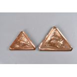 Two Newlyn arts and crafts copper triangular trays, both decorated with fish, stamped to lower left,