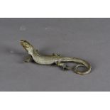 A bronze figural study modelled as a lizard, with curled tail, af to feet, 15 cm