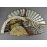 An olive wood and silk fan, with painted scene of a woman minstrel and songbird together with four