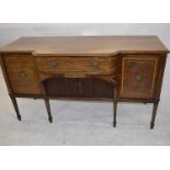 A Sheraton style mahogany and satinwood banded and boxwood and ebony line inlaid sideboard, having