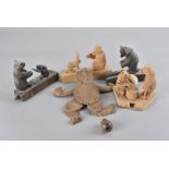 Six Black Forest carved novelty bear toys, including a wall hanging bear with movable limbs, another