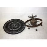 An early 20th Century brass and copper ceiling light, with central sphere with radiating outer rim