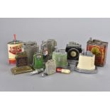 A collection of motoring related lighters, including one in the form of a petrol pump, a jerry can