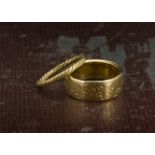Two Indian gold wedding bands, one high carat thicker example with engraved star designs, 9.3g,