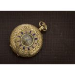 A pretty Edwardian period continental 14ct gold half hunter lady's pocket watch