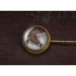 A Victorian Essex intaglio rock crystal stick pin, with circular panel with the head of a horse,