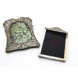 An Edwardian silver photograph frame, in the Art Nouveau taste, Birmingham 1905 by WCC, lacks stand,