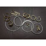 A collection of 9ct gold earrings and other earrings, varying styles, mostly marked and in pairs (