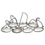 A set of seven early 19th century silver plated decanter labels, marked for: GIN, PORT, BRANDY,
