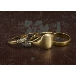 A group of four gold rings, including a 22ct gold wedding band, 4.7g, an 18ct gold signet ring, 7.2,