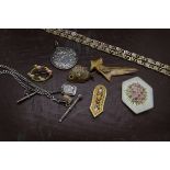 A collection of jewellery and other items, including a silver watch chain with 9ct charm, a gold and