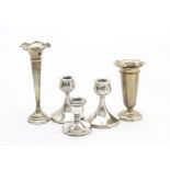 A pair of 1960s silver filled dwarf candlesticks, together with two silver filled trumpet vases