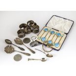 A collection of silver and coins and other items, including a pretty set of six silver and enamelled