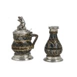 An interesting pair of Victorian silver mounted and stoneware cruet items, comprising a mustard