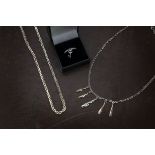 Eight modern items of silver and white metal jewellery, including four necklaces, a bangle, a