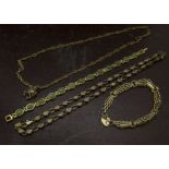 Two modern 9ct gold necklaces and a 9ct gold bracelet, one chain with shell links, the other with