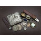 An interesting miscellaneous collection of small collectables, including a 1931 Dutch 2 1/2 guilden,