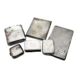 Three early 20th century silver cigarette cases, together with a silver vesta, matchbox holder,