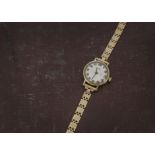A 1960s 9ct gold Rotary lady's wristwatch, circular case on 9ct gold bracelet, 13.5g