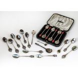 A collection of Georgian and later teaspoons and other items, including a cased set of coffee bean