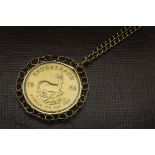 A 1970s Krugerrand gold coin in 9ct gold pendant mount, the 1974 dated 1 oz fine gold coin in