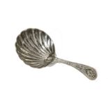 A George III silver tea caddy spoon, shell bowl with Old English bright cut handle, London 1802,