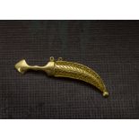 A 1970s Middle Eastern yellow metal brooch, in the form of a dagger in filigree scabbard, 8g