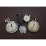 Four vintage pocket and wristwatches, including a Smiths and a Westclox pocket, and a Prestige
