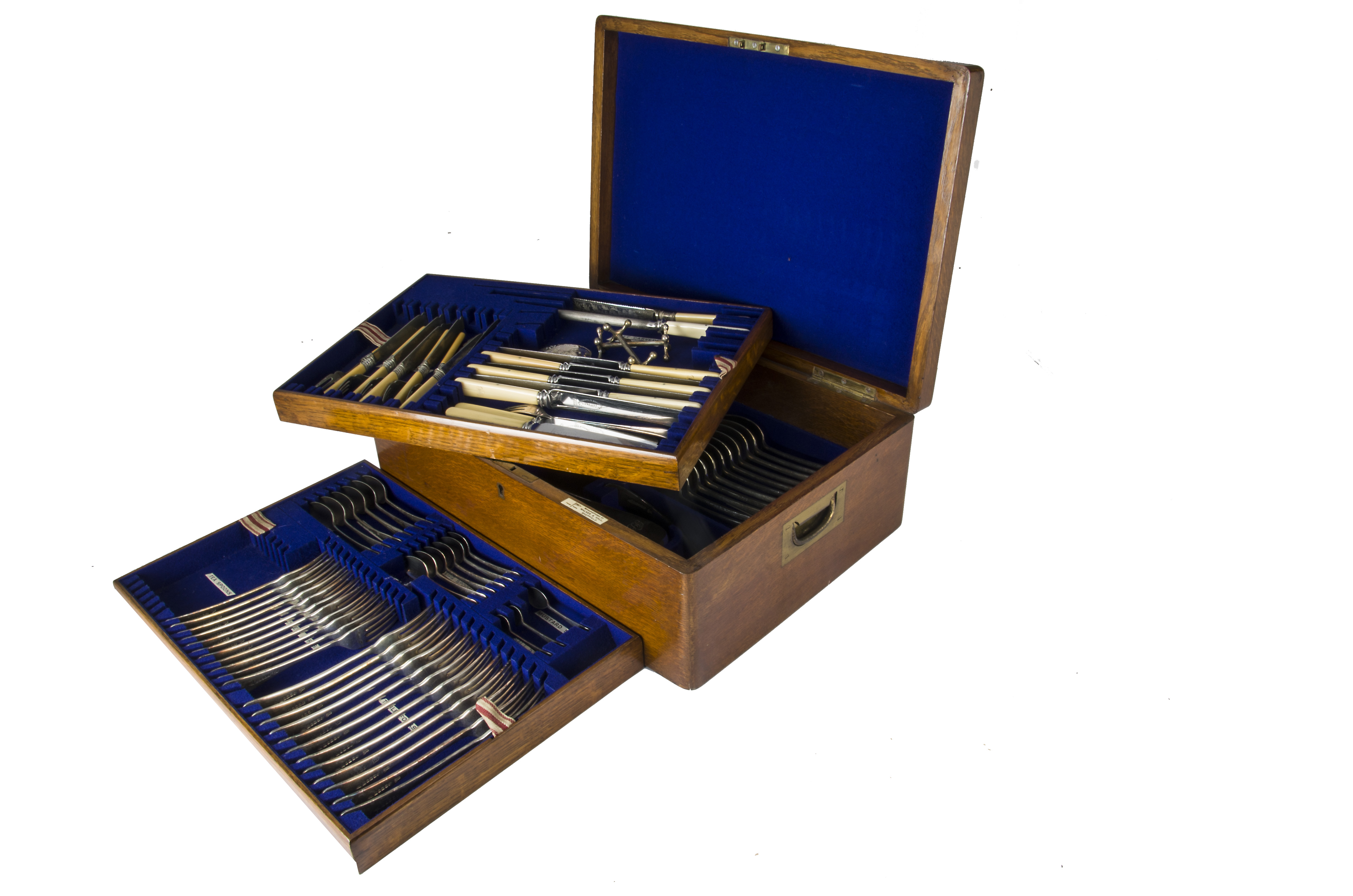 An Edwardian period part canteen of cutlery by Walker & Hall, presented in a W&H oak box with two