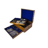 An Edwardian period part canteen of cutlery by Walker & Hall, presented in a W&H oak box with two