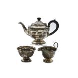 An Art Deco period silver three piece tea set by EV, each with footed base, Sheffield 1939, 22