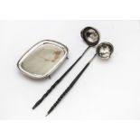 A 19th century continental silver toddy ladle, with coin inset to well, on twist whale bone