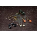 Five pairs of antique and vintage earrings, including a pair of two bead bullseye agate, a pair of