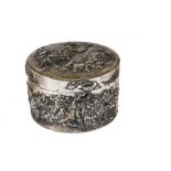 An Art Deco period Chinese silver circular box by Wang Hing, having raised flower designs, marked to