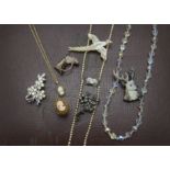 A collection of jewellery, including some gold chains, silver chains and other jewellery, and